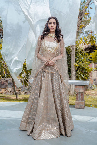 Champagne gold lehenga - Kavvach 